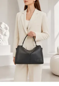 Detail view of women genuine leather boston handbag top layer cowhide classic black crossbody