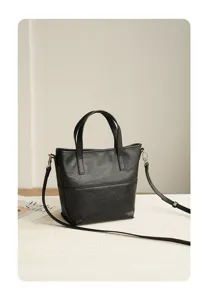 Minimalist black leather tote bag, chic vintage shoulder bag for women daily commuting.
