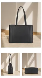 Black genuine leather tote bag detail view, showing large capacity and premium cowhide texture.