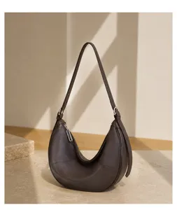 Brown leather crescent shoulder bag, stylish hobo underarm handbag for women daily wear.