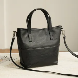 Minimalist black leather tote bag for women, vintage large capacity shoulder bag for daily commute.