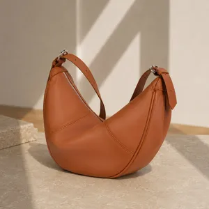 Brown leather crescent shoulder bag, stylish hobo purse for women, casual daily crossbody bag.