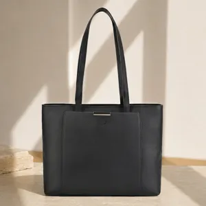 Black leather tote bag for women, spacious shoulder bag with top handles for daily work.