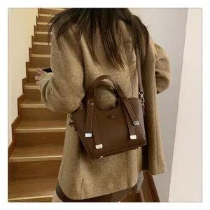 Brown leather tote bag for women, stylish shoulder crossbody handbag for autumn winter commuting.