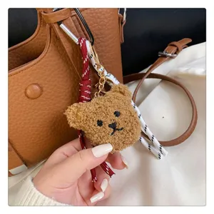 Cute plush bear keychain pendant accessory for women handbags and shoulder tote bags style.