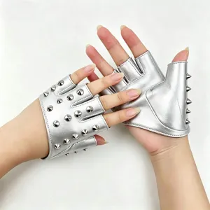 Detailed close-up of metallic silver fingerless punk leather gloves with metal spiked studs.
