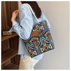 Canvas tote bag with geometric print, casual shoulder bag with thick rope handles and stylish patch.