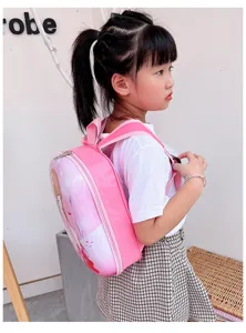 Kids pink hard shell cartoon backpack detail view, cute anime style school bag for children.