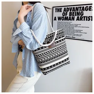 Black and white geometric canvas tote bag, lightweight large capacity single shoulder bag.