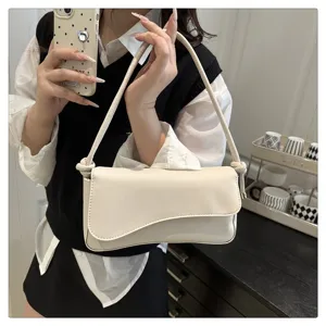 Minimalist white underarm shoulder bag for women, chic small handbag for daily fashion commute.