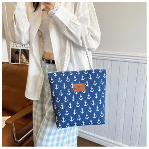 Casual canvas tote bag with anchor print, large capacity shoulder bag for women daily use.