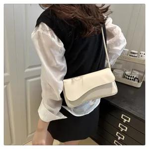 Elegant minimalist white underarm shoulder bag for women, chic design daily casual handbag.