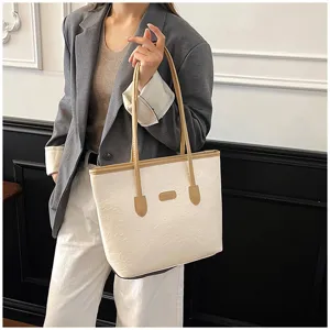Large capacity tote bag for women, stylish embossed shoulder bag with top handles, commuter casual.