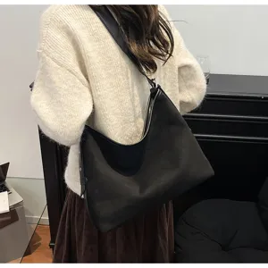 Classic black shoulder bag for women, stylish minimalist hobo bag with wide strap, daily use.
