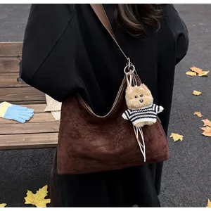 Brown retro suede shoulder tote bag for women with cute puppy plush pendant for autumn winter.