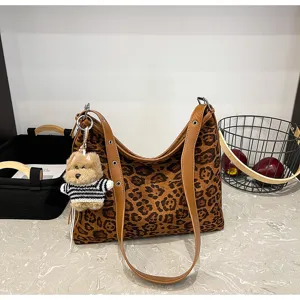 Leopard print tote bag for women, retro large capacity single shoulder bag with furry puppy charm.