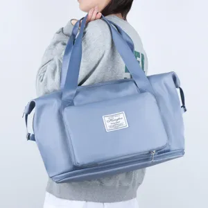Large capacity foldable travel duffel bag with wet dry separation for gym sports and daily trip details.