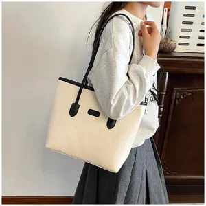 Large capacity tote bag for women, stylish embossed shoulder bag for daily commuting use.