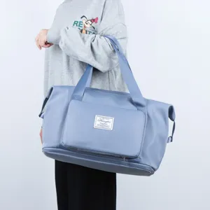 Large capacity travel duffel bag with wet and dry separation for fitness and sports.