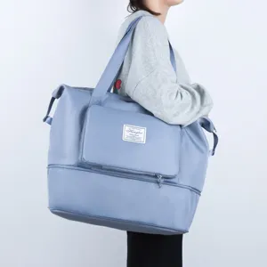 Large capacity foldable travel duffel bag for fitness sports and luggage storage, blue color.