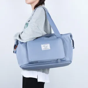Large capacity foldable travel duffel bag for fitness sports with wet dry separation.