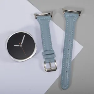 Detail view of light blue leather replacement watch strap with stainless steel buckle design.