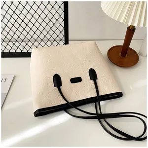 Large capacity PU leather tote bag for women, stylish everyday shoulder and handbag.