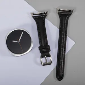 Black leather watch strap detail view, slim waist design with silver buckle for smart watch.