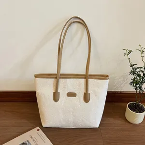 Large capacity women tote bag 2025 autumn winter new embossed shoulder bag commute handbag