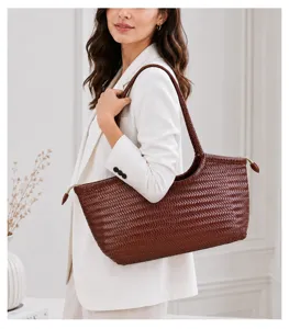 Woven leather shoulder bag for women, vintage handmade dark brown tote handbag detail.