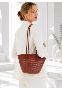 Elegant brown woven leather shoulder bucket bag for women, retro french style daily use.