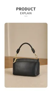 Black genuine leather top-handle shoulder bag detail shot with fine hardware and stitching.