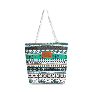 Canvas tote bag with ethnic geometric print and comfortable rope handles for daily use.
