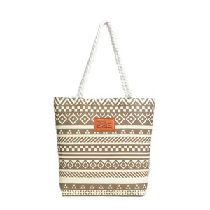 Canvas tote bag with ethnic geometric print and comfortable rope handles for daily casual use.