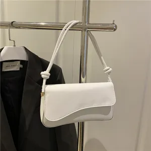 Elegant white underarm shoulder bag with minimalist flap design, stylish handbag for women