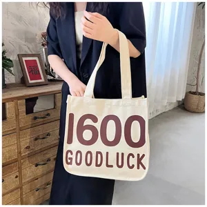 Canvas tote bag with number and letter print, casual shoulder bag for women and students.