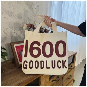 Canvas tote bag, off-white shoulder handbag with large number and letter print for daily use.
