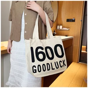 Canvas tote bag for women, student casual shoulder bag with letter print, stylish daily handbag.