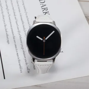 Detailed view of white leather watch strap with classic round dial design and metal buckle.
