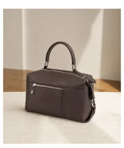 Brown genuine leather top-handle handbag, stylish commuter shoulder bag for women with large capacity.