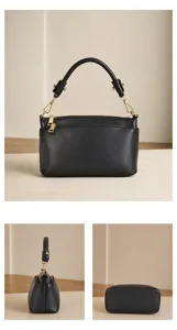 Detailed view of the black genuine leather top-handle bag, showing fine texture and hardware.