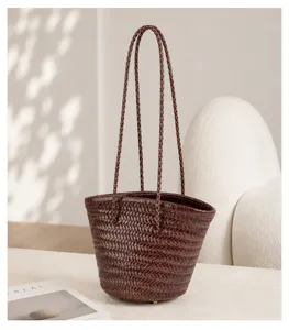 Elegant dark brown woven leather bucket bag, French vintage handmade shoulder bag for women.