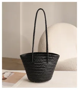 French vintage black leather woven bucket bag, elegant hand-woven basket shoulder bag.