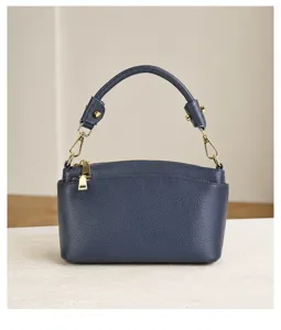 Dark blue top layer cowhide leather shell shoulder bag, fashionable daily casual handbag.