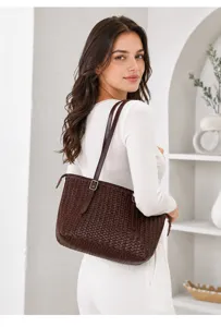 Brown woven leather tote bag detail showing vintage basket style and large daily fashion capacity.