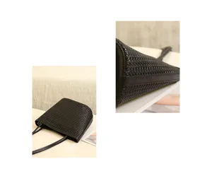 Detailed view of black woven leather handbag, premium cowhide texture, fine craftsmanship.