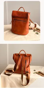 Detailed view of the vintage brown genuine leather backpack with zipper pockets and straps.