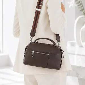Elegant brown leather shoulder bag for women, stylish top handle boston bag with strap.
