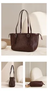 Detailed view of a brown woven leather tote bag, retro basket style with double handles.