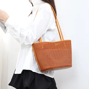 Brown genuine leather woven tote bag for women, casual minimalist shoulder bag for daily use.